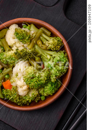Delicious fresh vegetables steamed carrots, broccoli, cauliflower Delicious fresh vegetables steamed carrots, broccoli, cauliflower 109947109