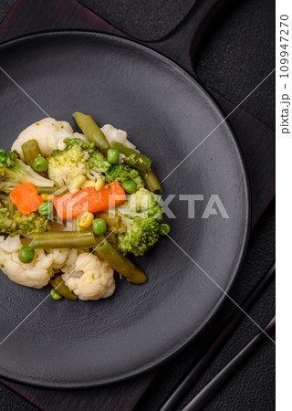 Delicious fresh vegetables steamed carrots, broccoli, cauliflower Delicious fresh vegetables steamed carrots, broccoli, cauliflower 109947270