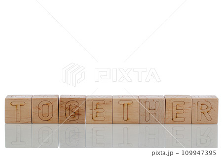 Wooden cubes with letters together on a white background Wooden cubes with letters together on a white background 109947395