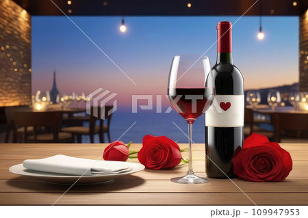 Bottle and glasses of wine on table in cafe. Valentine's Day celebration table setting, romantic atmosphere. 109947953