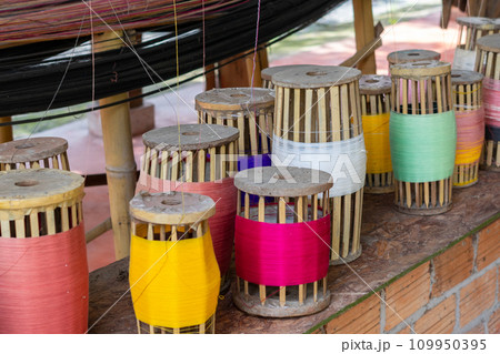 Stack of colorful silk rolls Stack of colorful silk rolls 109950395