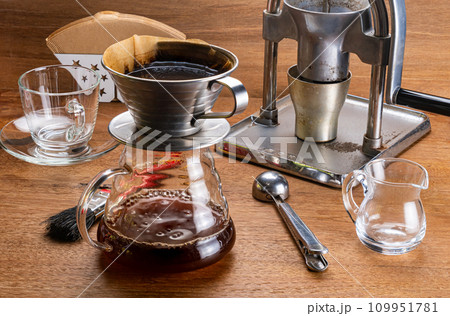 High angle view of equipment for dripping coffee. High angle view of equipment for dripping coffee. 109951781