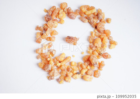 Frankincense or olibanum aromatic resin isolated on white background used in incense and perfumes. Frankincense or olibanum aromatic resin isolated on white background used in incense and perfumes. 109952035
