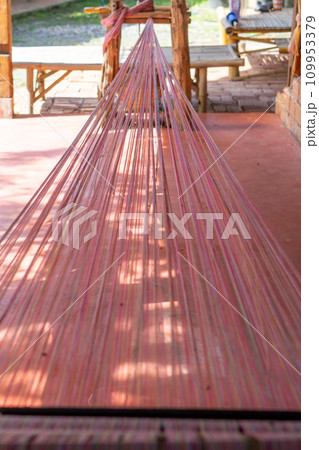 Part of a loom for homemade silk production Thailand 109953379