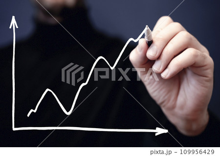 Business growth sale concept. Hand draws a graph of economic profit growth and development 109956429
