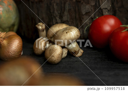 Champignon mushrooms with other ingrediants and vegetables in the kitchen Champignon mushrooms with other ingrediants and vegetables in the kitchen 109957518