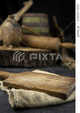 Cutting board in rustic kitchen with empty space for photo montage Cutting board in rustic kitchen with empty space for photo montage 109957597