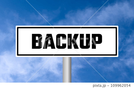 Backup road sign on blue sky background 109962054