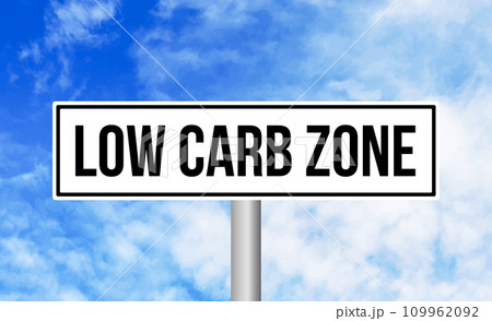 Low carb zone road sign on blue sky background 109962092