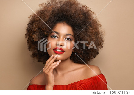 Beauty portrait of African American girl with afro hair Beauty portrait of African American girl with afro hair 109971155