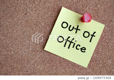 Out of office text on sticky note. Out of office concept. 109973308