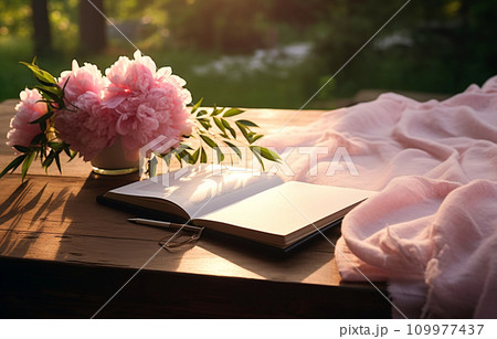 Open notebook and pink peonies, romantic greeting card Open notebook and pink peonies, romantic greeting card 109977437