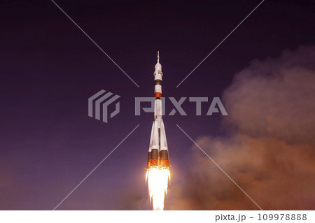 Rocket launch into space. Elements of this image furnished by NASA Rocket launch into space. Elements of this image furnished by NASA 109978888