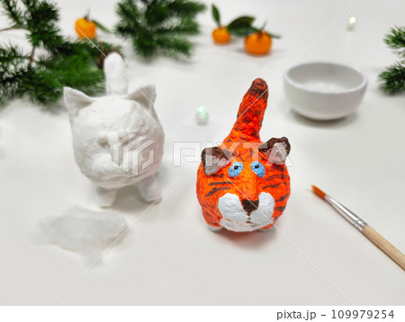 Cheerful wadding toy cats by handmade. Funny red and white cats, Cheerful wadding toy cats by handmade. Funny red and white cats, 109979254