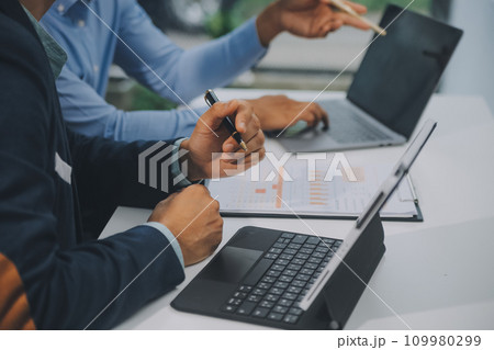 Group of business people working together in the office new concept business project presentation ideas. Group of business people working together in the office new concept business project presentation ideas. 109980299