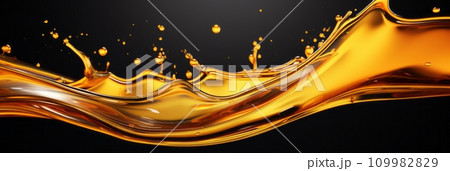 Splash of orange liquid oil on dark background 109982829