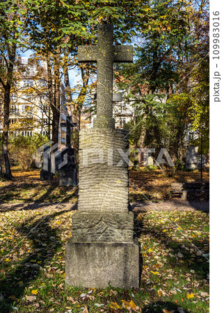 View of famous Old North Cemetery of Munich, Germany with historic gravestones. 109983016