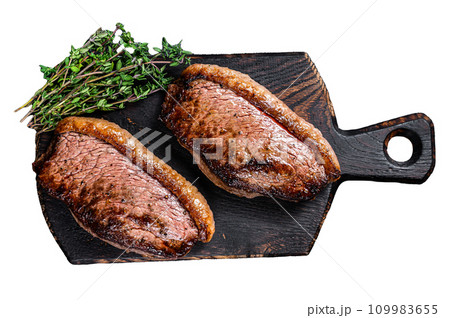 BBQ Grilled top sirloin cap or picanha steak Isolated on white background, top view. 109983655