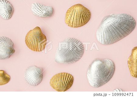 Shined cockle shells collection on pink. Shined cockle shells collection on pink. 109992471