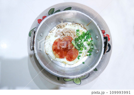 fried egg, Vietnamese egg with sausage and ground pork or minced pork fried egg, Vietnamese egg with sausage and ground pork or minced pork 109993991