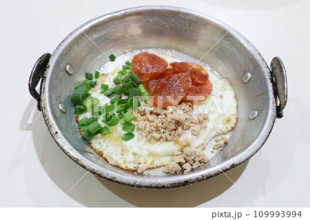 fried egg, Vietnamese egg with sausage and ground pork or minced pork fried egg, Vietnamese egg with sausage and ground pork or minced pork 109993994