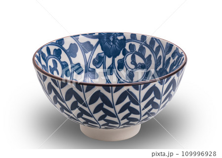 High angle view of blue pattern ceramic bowl with black edge High angle view of blue pattern ceramic bowl with black edge 109996928
