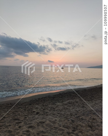 Panorama of an amazing sunset over the sea off the coast of Ascea, town in the province of Salerno in the Campania region of southwestern Italy, part of the Cilento traditional area Panorama of an amazing sunset over the sea off the coast of Ascea, town in the province of Salerno in the Campania region of southwestern Italy, part of the Cilento traditional area 109998507
