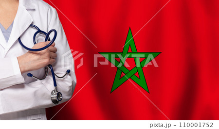 Maroccan medicine and healthcare concept. Doctor close up against flag of Marocco background 110001752