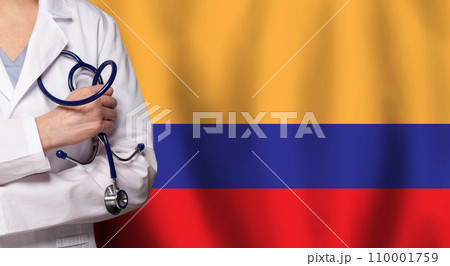 Colombian medicine and healthcare concept. Doctor close up against flag of Colombia background Colombian medicine and healthcare concept. Doctor close up against flag of Colombia background 110001759
