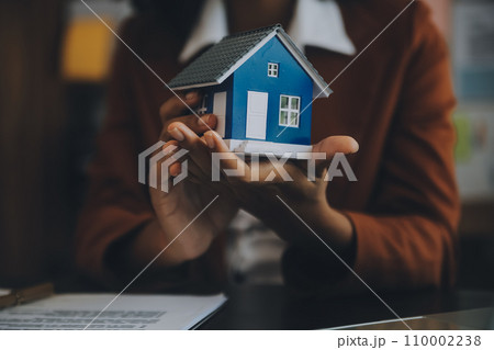 buy or sell real estate mortgage, Sale representative offer house purchase contract to buy a house or apartment and mortgage Money and Financial Concepts 110002238