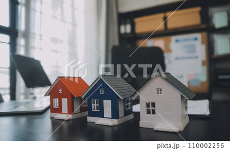 buy or sell real estate mortgage, Sale representative offer house purchase contract to buy a house or apartment and mortgage Money and Financial Concepts 110002256
