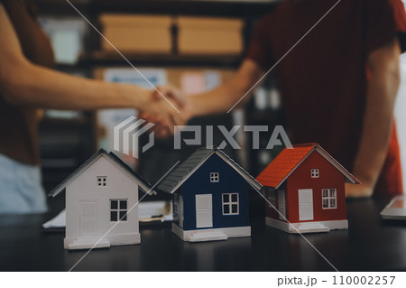 buy or sell real estate mortgage, Sale representative offer house purchase contract to buy a house or apartment and mortgage Money and Financial Concepts buy or sell real estate mortgage, Sale representative offer house purchase contract to buy a house or apartment and mortgage Money and Financial Concepts 110002257