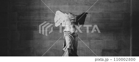 The Winged Victory of Samothrace, or the Nike of Samothrace. Exhibited at the Louvre Museum in Paris, at the top of the main staircase, since 1884. Black and white photography. The Winged Victory of Samothrace, or the Nike of Samothrace. Exhibited at the Louvre Museum in Paris, at the top of the main staircase, since 1884. Black and white photography. 110002800