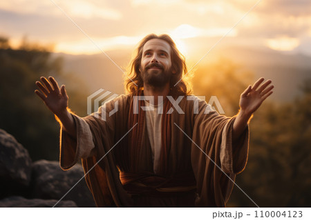 Jesus Christ with outstretched hands, a compassionate expression, set against a backdrop of a golden sunrise, symbolizing hope and redemption 110004123