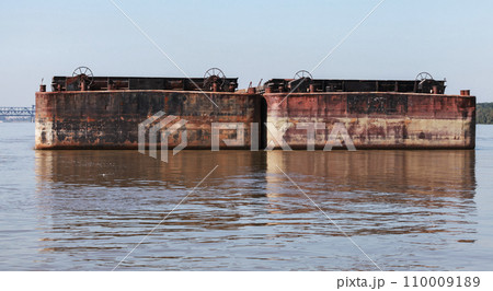 Two barges are anchored at Danube river Two barges are anchored at Danube river 110009189