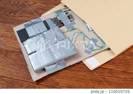 Mail bomb IED - Improvised Explosive Device with c4 and cell phone module in envelope Mail bomb IED - Improvised Explosive Device with c4 and cell phone module in envelope 110010720