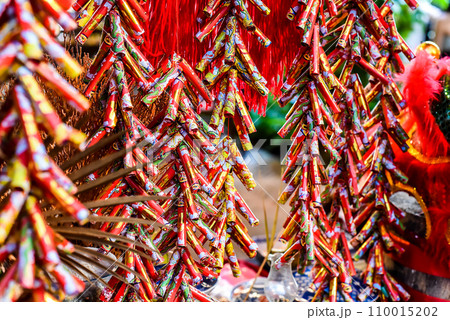 Many red fireworks hanging in Vietnam for Tet Lunar New Year Many red fireworks hanging in Vietnam for Tet Lunar New Year 110015202