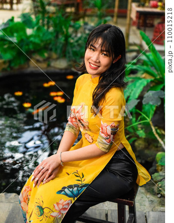 Beautiful Vietnamese woman in traditional vietnamese dress in Tet  Lunar New Year 110015218