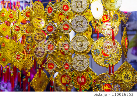 many decorations as symbol of wealth in the market for Tet Lunar New Year many decorations as symbol of wealth in the market for Tet Lunar New Year 110016352