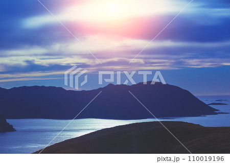Beautiful rocky seascape in the evening. Rocks in the sea at sunset. Wilderness, beautiful nature of Norway Beautiful rocky seascape in the evening. Rocks in the sea at sunset. Wilderness, beautiful nature of Norway 110019196