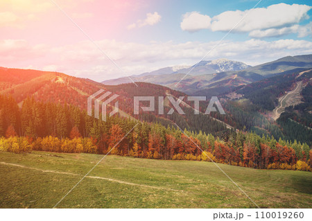 Autumn in the mountains. View of the mountains in autumn. Beautiful nature landscape. Carpathian mountains. Bukovel, Ukraine 110019260