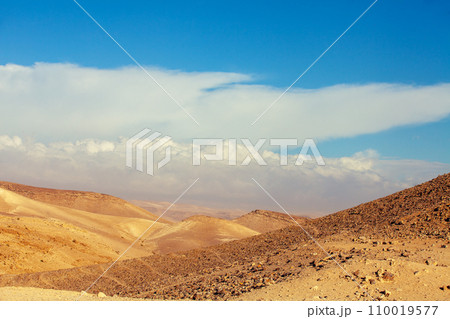 Mountainous desert with cloudy sky. Judean desert in Israel 110019577