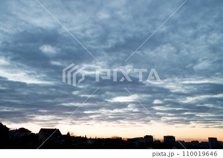 Bright clouds in the evening sky Bright clouds in the evening sky 110019646