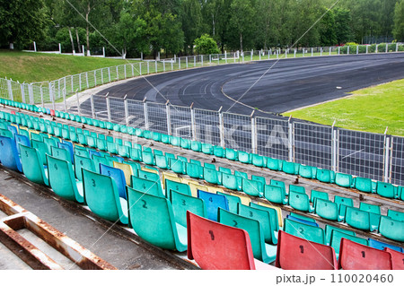 Seats and running track in the stadium Seats and running track in the stadium 110020460