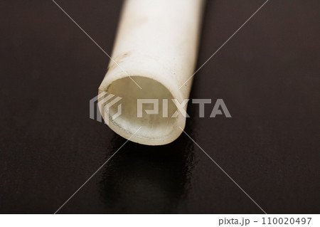 The end of the white plastic tube The end of the white plastic tube 110020497