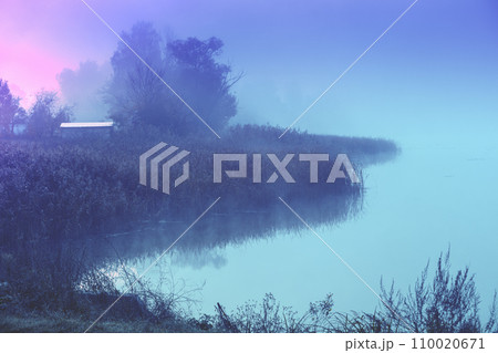 Early misty morning. Sunrise over the lake. Rural landscape in autumn. Wilderness. Serenity lake Early misty morning. Sunrise over the lake. Rural landscape in autumn. Wilderness. Serenity lake 110020671