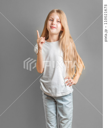 Adorable little girl direct finger up 110021678