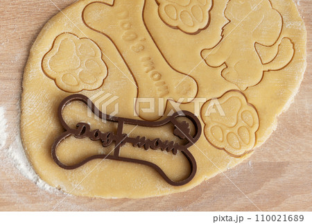 Preparing homemade healthy dog treats. 110021689