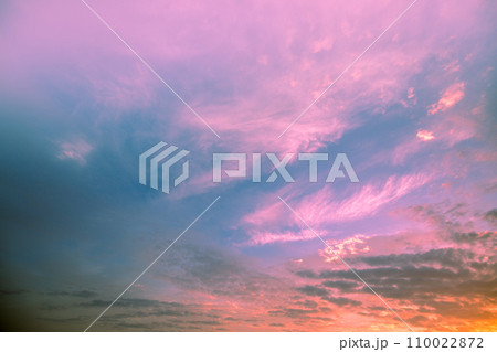 Colorful cloudy sky at sunset. Gradient color. Sky texture. Abstract nature background 110022872