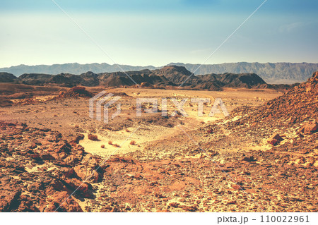 View of the desert. View of the valley with mountains on the backdrop. Timna Park, Eilat, Israel View of the desert. View of the valley with mountains on the backdrop. Timna Park, Eilat, Israel 110022961